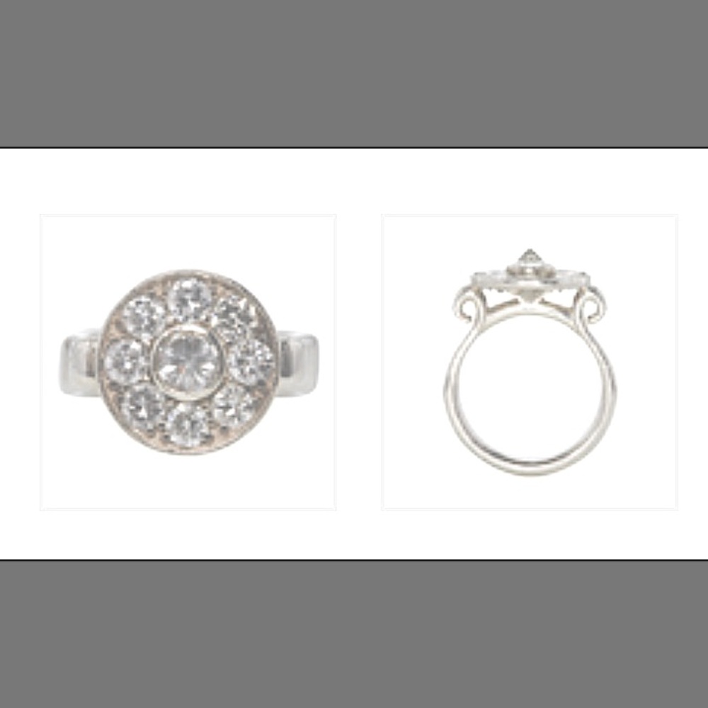 Estate halo diamond ring with unique center stone